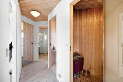 a hallway with wood paneled walls and a hallway with at 1039-Thisted-Niels-Vognmands-Vej-19 in Torsted