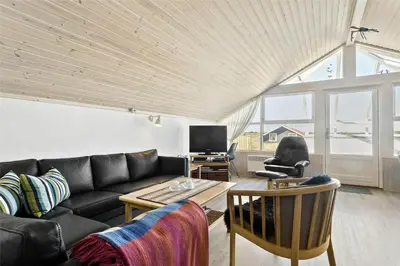 a living room with a couch and a table at 807-Thisted-Grarisvej-13 in Thisted