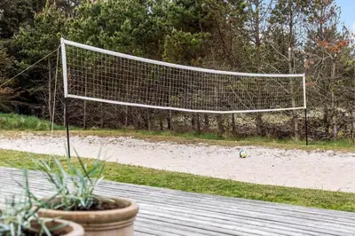 a net on a beach with a volley ball at 931-Thisted-Pinbak-24 in Torsted