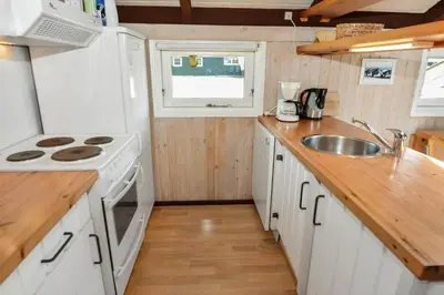 a small kitchen with a sink and a stove at 829-Thisted-Nordsovej-188 in Thisted