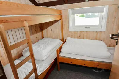 a bedroom with two bunk beds and a window at 829-Thisted-Nordsovej-188 in Thisted
