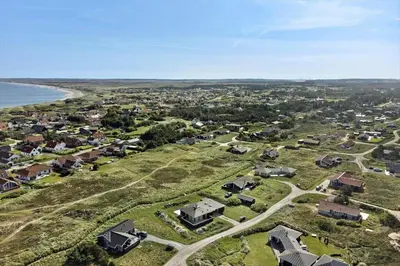 an aerial view of a small town next to the ocean at 926-Thisted-Niels-Vognmands-Vej-15 in Torsted