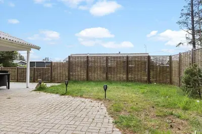 a fence with two parking meters in a yard at 862-Thisted-Nordsovej-162 in Thisted