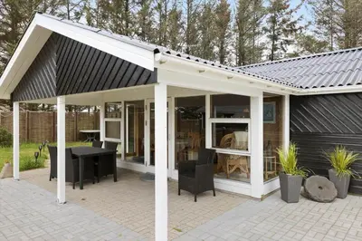 a roof over a patio with a table and chairs at 862-Thisted-Nordsovej-162 in Thisted