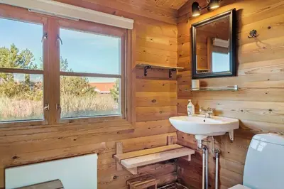 a bathroom with a sink and a mirror at 651-Snedsted-Somaerkevej-50 in Snedsted
