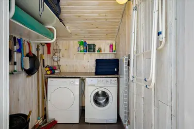 a washer and dryer in a tiny house at 608-Thisted-Vesterhavsgade-49-A in Thisted
