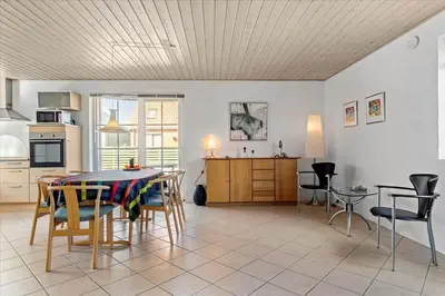 a kitchen and dining room with a table and chairs at 133-Thisted-Jorgen-Hedes-Vej-10 in Thisted