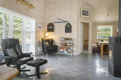 a living room with two chairs and a table at 879-Thisted-Pighvarvej-3 in Thisted