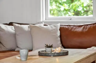 a coffee table in a living room with a couch at 576-Thisted-Klemsvej-26-E in Thisted