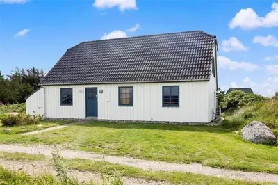 a white house with a black roof at 520-Snedsted-Sarasvej-10 in Snedsted