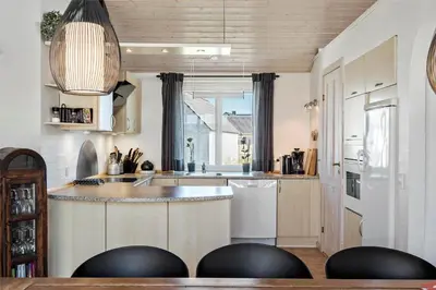 a kitchen with a island in the middle of a room at 451-Thisted-Nordsovej-20 in Thisted