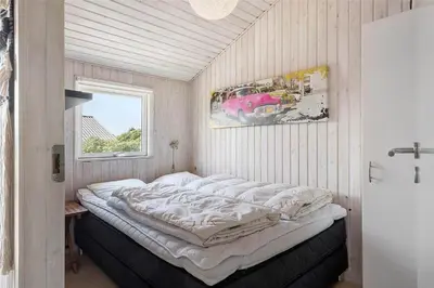 a large bed in a room with a window at 770-Thisted-Nordsovej-180 in Thisted