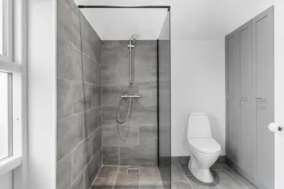 a bathroom with a shower and a toilet at 827-Thisted-Orredvej-11 in Thisted
