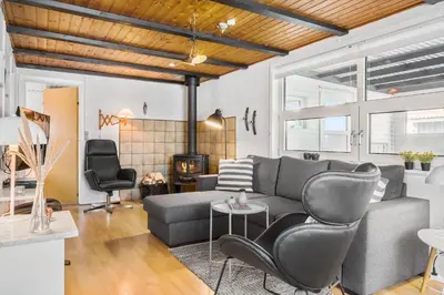 a living room with a gray couch and chairs at 271-Thisted-Nordsovej-88 in Thisted