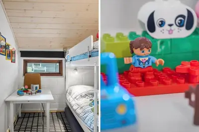 a lego room with a bunk bed and a bedroom with a table at 834-Thisted-Revlingvej-9 in Thisted