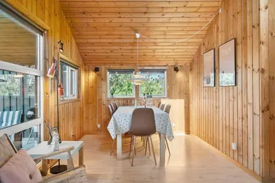 a dining room with a table and chairs at 646-Thisted-Bredkaervej-43 in Thisted