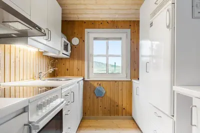 a kitchen with white appliances and a window at 861-Thisted-Havbovej-41 in Thisted