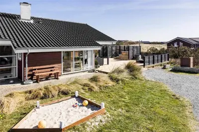 a house with a pool table in the yard at 951-Thisted-Bavnbak-39 in Torsted
