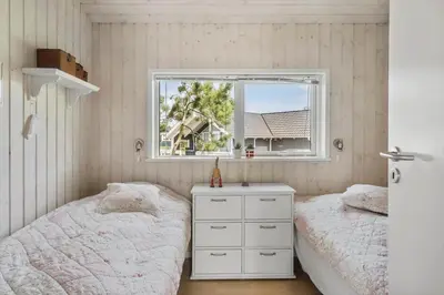 a bedroom with two twin beds and a window at 866-Thisted-Klemsvej-35 in Thisted
