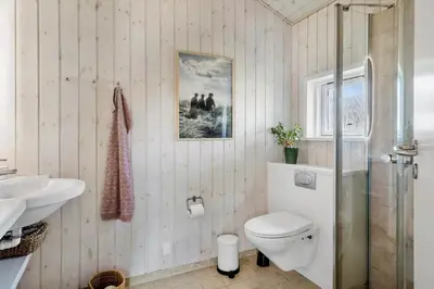 a bathroom with a toilet and a sink at 866-Thisted-Klemsvej-35 in Thisted