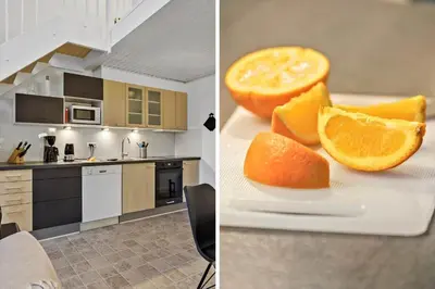 a white plate with orange slices on top of a kitchen at 254-Vestervig-Havnevej-1-lejl-4 in Vestervig