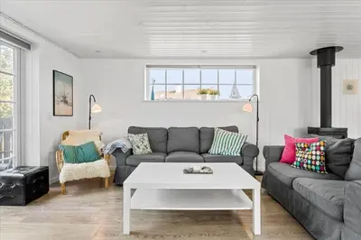 a living room with a couch and a table at 744-Thisted-Orredvej-26 in Thisted