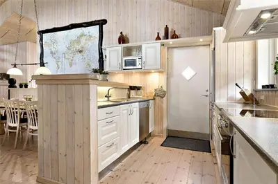 a kitchen with white cabinets and a counter top at 929-Thisted-Brandisvej-19 in Torsted