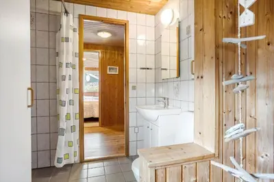 a bathroom with a sink and a toilet and a shower at 533-Thisted-Fiskervej-153 in Thisted