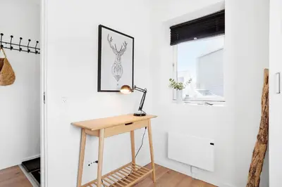 a table in a room with a lamp on it at 556-Thisted-Havstokken-24-A in Thisted