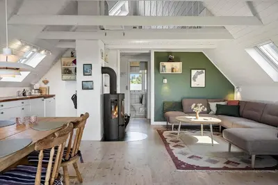 a living room with a couch and a table at 580-Thisted-Gaeslingevej-5 in Thisted