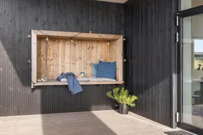 a wall with a shelf with a pillow on it at 109-Thisted-Lyngbakken-9 in Thisted