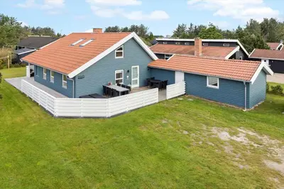 an aerial view of a blue house with a yard at 144-Thisted-Nordsovej-204-D in Thisted