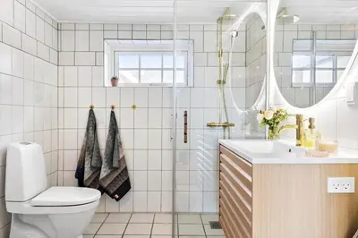 a bathroom with a toilet and a sink at 194-Vestervig-Vesterhavsvej-7-C in Vestervig