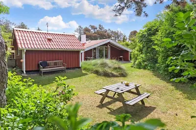 a picnic table in front of a red shed at 531-Thisted-Ingerslevvej-5 in Thisted