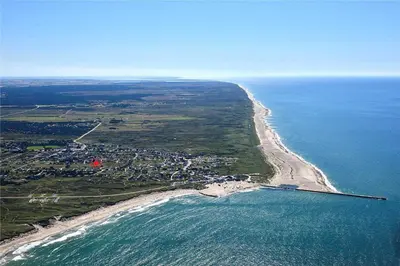 an aerial view of a beach and the ocean at 567-Thisted-Fiskervej-67 in Thisted