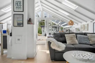a living room with a couch and a table at 713-Thisted-Tranebaervej-10 in Thisted