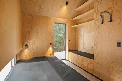 a bed in a room with a window at 1061-Thisted-Spanggardsvej-85-B in Torsted