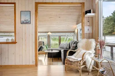 a living room with a couch and a table at 1341-Thisted-Mose-Bolle-Vej-5 in Thisted