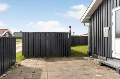 a black fence in front of a house at 1336-Thisted-Nordsovej-50 in Thisted