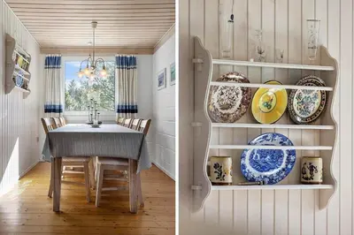 a dining room with a table and plates on shelves at 246-Thisted-Pighvarvej-16 in Thisted