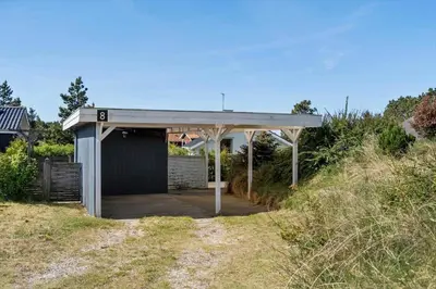 a shed with a roof on top of a hill at 1342-Thisted-Mose-Bolle-Vej-8 in Thisted