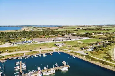 an aerial view of a marina with boats in the water at 1346-Vestervig-Havnevej-1-lejl-15 in Vestervig