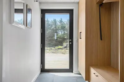 a door leading into a room with a view at 1068-Thisted-Klovborgsti-5-A in Torsted