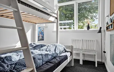 a bedroom with a bunk bed and a window at Pet Friendly Home In Spøttrup With Wifi in Spottrup