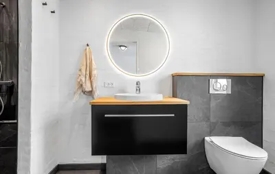 a bathroom with a sink and a mirror at Awesome Home In Spøttrup With Wifi in Spottrup