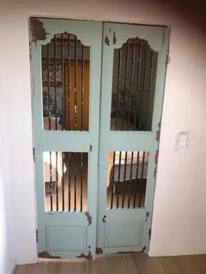 a pair of doors with iron bars on them at Lykkeholms Bella Vista in Spottrup