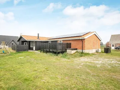 a house with solar panels on the roof at 8 person holiday home in Harboøre-By Traum in Harboør