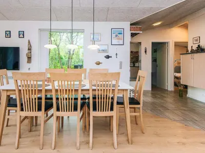 a dining room with a table and chairs at 7 person holiday home in Hurup Thy-By Traum in Sønder Ydby