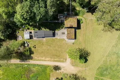 an overhead view of a house in a field at Summer House Close To Nature By The Limfjord in Nykøbing Mors