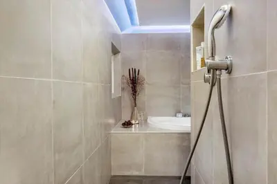 a bathroom with a sink and a blue ceiling at LK1924-Lokken-Lydiavej-4 in Løkken